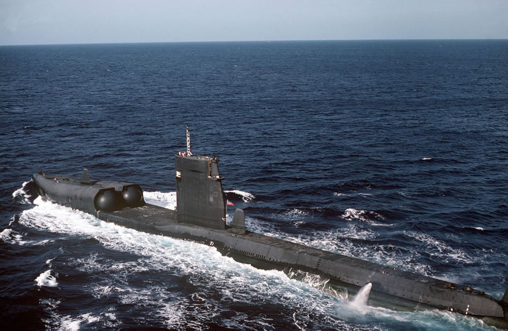 USS Grayback (LPSS-574) was commissioned in 1957 to launch Regulus missiles. Two chambers in the bow provided this capability that in 1964 became obsolete for missiles but ideal for SEAL operations. The chambers were converted in 1967 to conduct mass-swimmer lock-outs and foremost SDV operations. Grayback deployed to the Western Pacific in 1968 to support SEAL Unconventional Warfare operations until decommissioned in January 1984