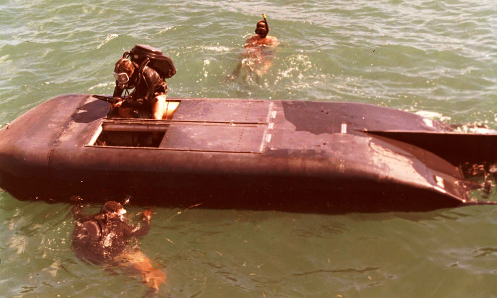 MK IX SDV crew entering the boat for a training operation. MK IX SDV crew entering the boat for a training operation.