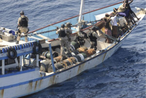 Navy SEALs conducting a Visit, Board, Search, and Seizure (VBSS) maritime interception operation. (U.S. Navy)