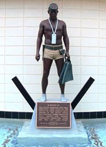 Signature statue of the “Naked Warrior” at the Navy UDT-SEAL Museum. Signature statue of the “Naked Warrior” at the Navy UDT-SEAL Museum.
